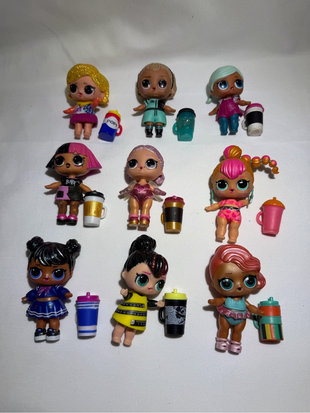 L.O.L. Surprise! Mini Dolls Set with Pink, Blue, Gold, Black & Teal Accents